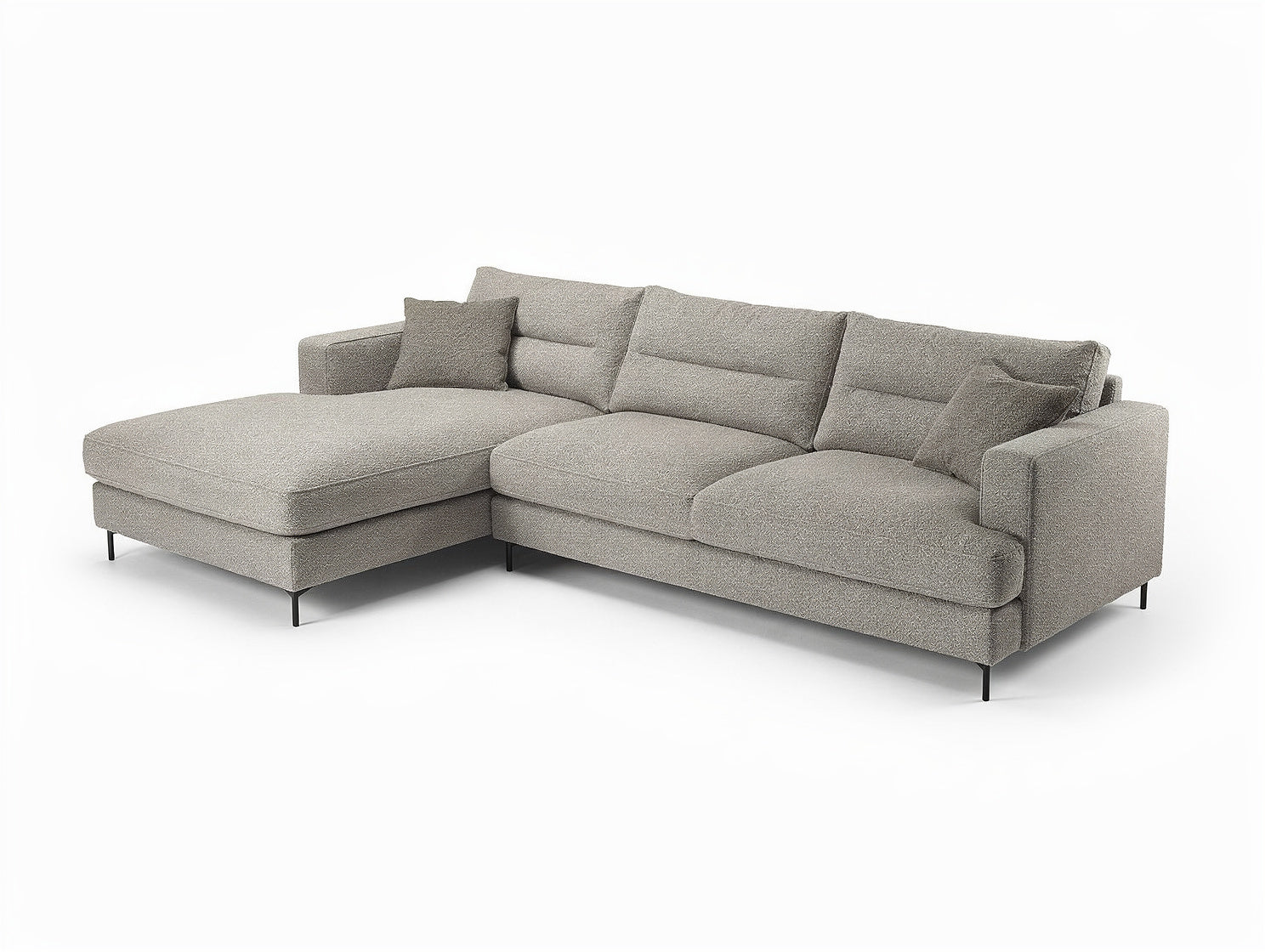 **Sofa narożny z szarym obiciem i poduszkami**